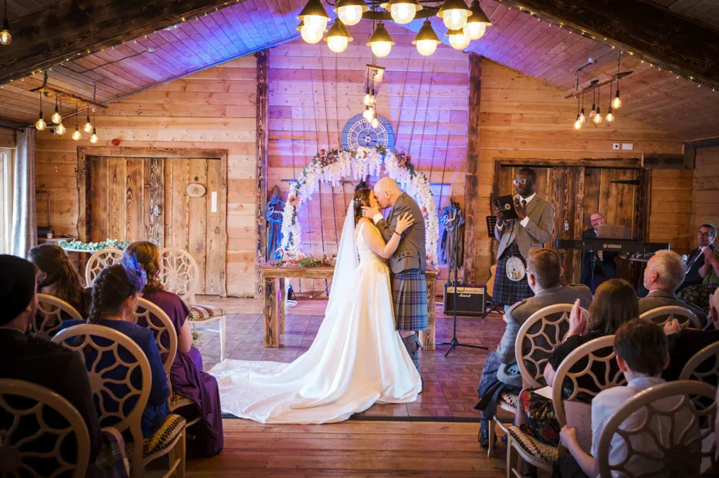 Lisa and Jonathon sharing their first kiss at Silverwood Resort