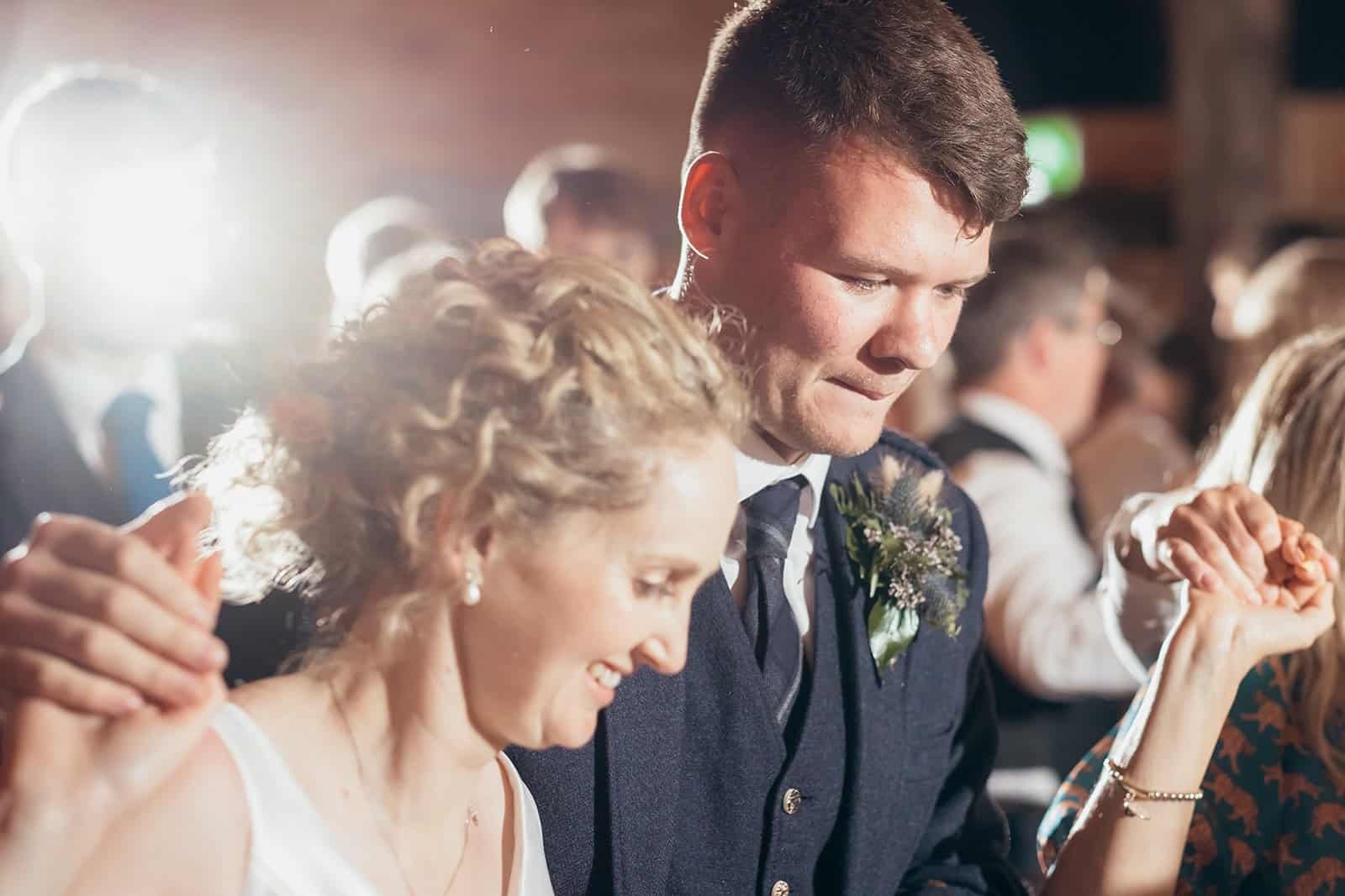 Happy couple dancing at their wedding reception venue