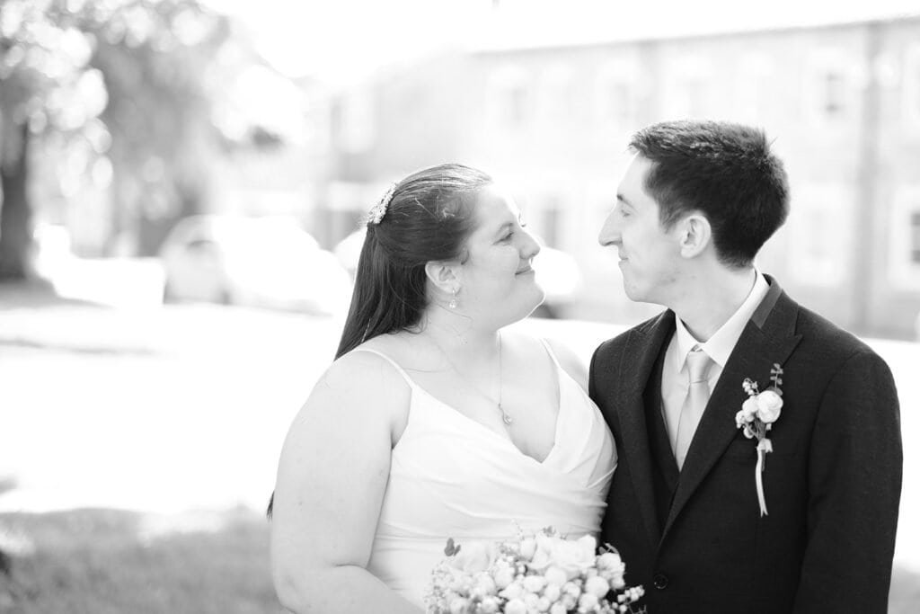 Bride and groom gazing at each other outdoors on wedding day in Northallerton