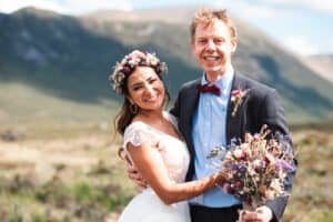 Bride and groom smiling in Isle of Skye elopement