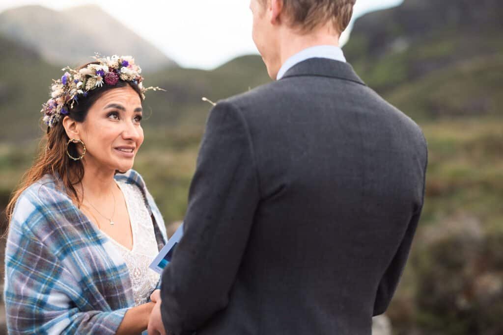 Bride and groom exchanging vows in outdoor ceremony on the amazing Isle of Skye
