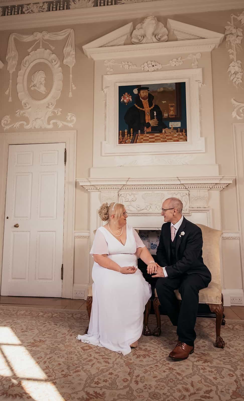 Couple sharing a moment on elegant vintage wedding day