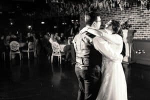 Bride and groom share first dance at wedding reception