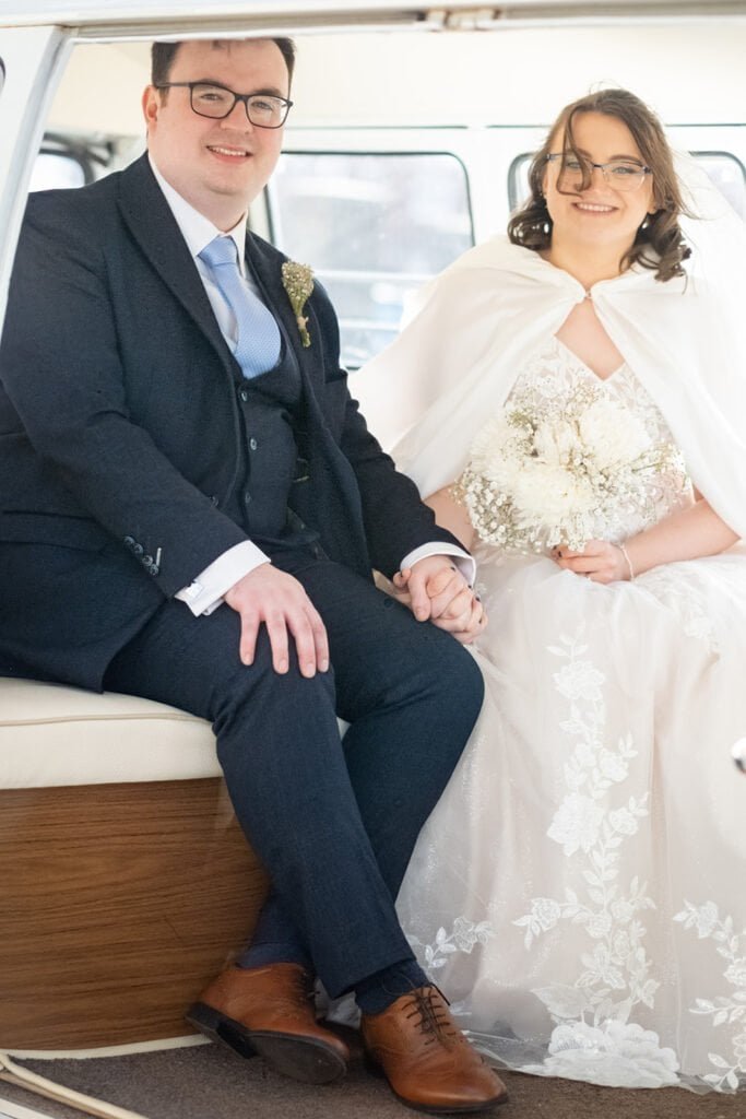Bride and groom smiling together on their wedding day